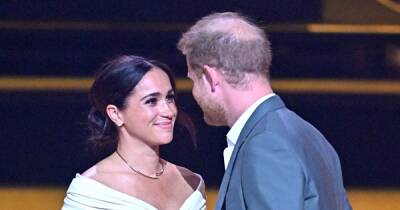 Meghan and Harry share intimate kiss on stage after she gushes over him at Invictus - www.ok.co.uk - Netherlands - Afghanistan - city Hague, Netherlands