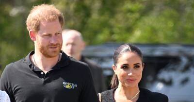 Meghan Markle comforts Harry as they hold hands following secret visit to Queen - www.ok.co.uk - Britain - Netherlands