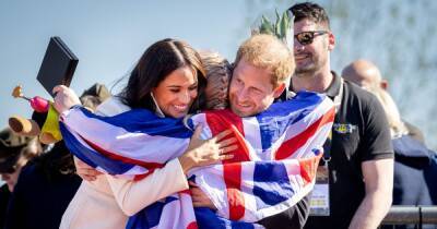 Prince Harry and Meghan Markle embrace British athlete in heartwarming moment - www.ok.co.uk - Britain