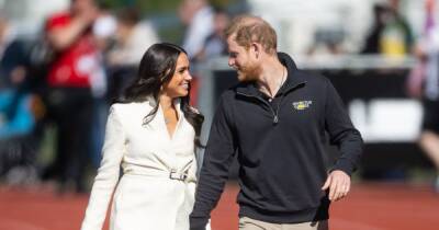 Meghan Markle and Prince Harry can't keep their hands off each other on day two of Invictus Games - www.ok.co.uk - Britain - Netherlands