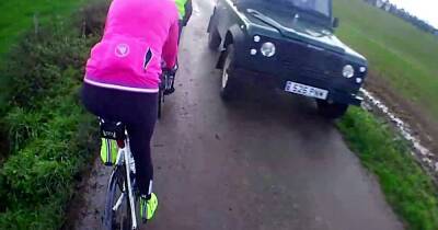 Viewers divided over footage showing cyclist falling into a ditch after a Land Rover drives by - www.manchestereveningnews.co.uk - Beyond