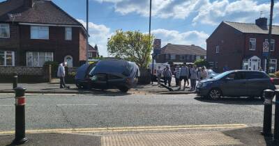 Car flips onto side after smashing into bollard - manchestereveningnews.co.uk - Manchester - county Oldham - county Lane
