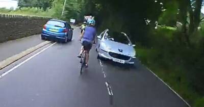 Driver slapped with £400 fine after video captures them driving too close to cyclists - www.manchestereveningnews.co.uk - Manchester - city Sheffield