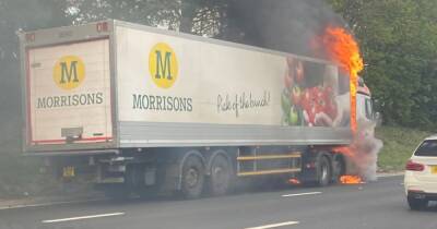 Morrisons responds after video captures moment delivery lorry bursts into flames on M62 - www.manchestereveningnews.co.uk - Britain - Ukraine - Russia