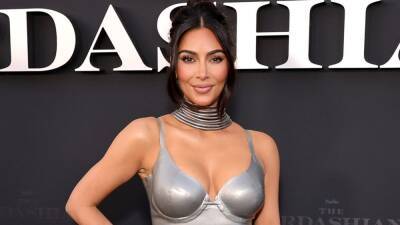 Kim Kardashian Reacts to Claims She Photoshopped Out Her Belly Button - www.etonline.com - USA - Columbia