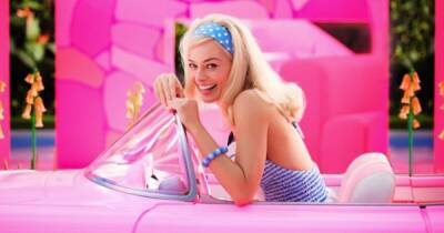 Barbie movie first look as Margot Robbie is seen as iconic doll in pink car - www.ok.co.uk
