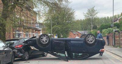 Moment car flips over in middle of quiet Prestwich street after three car collision - www.manchestereveningnews.co.uk - Manchester