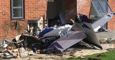 Plane destroyed and pilot in hospital after flying into block of flats - www.manchestereveningnews.co.uk - Manchester