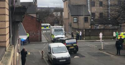 Police lock down Rutherglen street after ‘disturbance’ breaks out as area taped off - www.dailyrecord.co.uk - Scotland