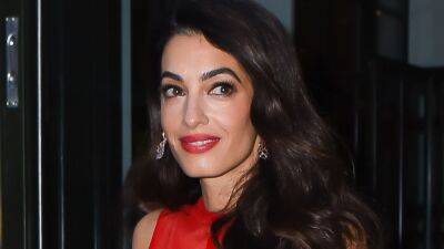 Amal Clooney's Edgy Style Departure Continues With Thigh-High Boots - www.glamour.com