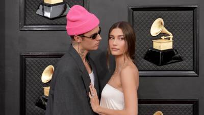 Hailey and Justin Bieber Couldn't Keep Their Hands Off Each Other on the Grammys Red Carpet - www.glamour.com