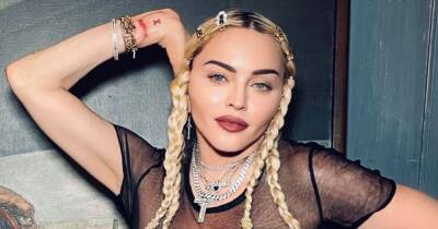 Madonna, 63, and son David, 16, get matching tattoos after singer baffles fans with video - www.ok.co.uk - France