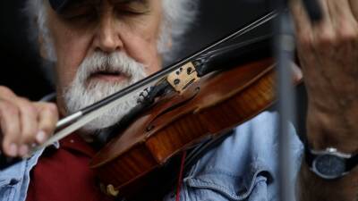 Cajun fiddler Michael Doucet breaks hip on tour in Alaska - abcnews.go.com - state Alaska - Ohio - Michigan - city Anchorage