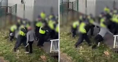 Police clash with football fans in chaotic post-match scenes after Wigan v Bolton derby - www.manchestereveningnews.co.uk - Manchester