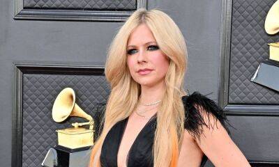 Avril Lavigne fans go wild as she shares heartfelt tribute following surprise appearance - hellomagazine.com