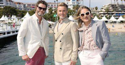 Robbie Williams - Jason Orange - Gary Barlow - Mark Owen - Howard Donald - Take That - Take That's Mark Owen looks unrecognisable as he joins bandmates Gary and Howard in Cannes - ok.co.uk - France - county Howard - city Gary
