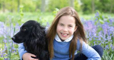 Princess Charlotte pictured in seventh heaven with pet dog Orla on birthday - www.msn.com - county Norfolk