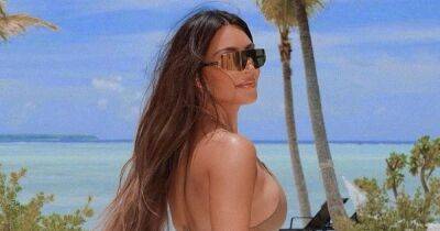 Kim Kardashian - Kourtney Kardashian - Travis Barker - Kim Kardashian West - Kim Kardashian bares all in string bikini ahead of sister Kourtney's wedding - ok.co.uk - Italy