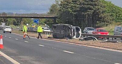 M8 crash aftermath sees 'pram and toys' littered in debris as two adults and child taken to hospital - www.dailyrecord.co.uk - Scotland