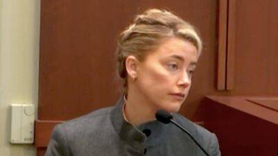 Amber Heard - Amber Heard Lawyer Interrupted in Court by a Chorus of Storm Alerts - thewrap.com - Washington