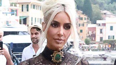 Kim Kardashian - Kourtney Kardashian - Kim Kardashian Rewore Two Dresses at Once for Kourtney Kardashian's Italian Wedding - glamour.com - London - Italy - county Love