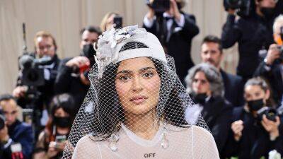 Kylie Jenner Wore a Wedding Dress With a Backwards Trucker Hat to the Met Gala - www.glamour.com