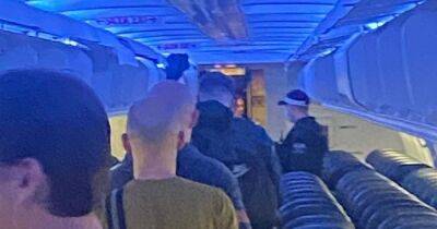 Police called to help rescue TUI passengers 'abandoned' for three hours on Manchester flight which never took off - manchestereveningnews.co.uk - Britain - Manchester