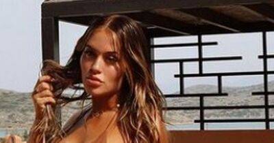 Lewis Burton - Christmas Eve - Lottie Tomlinson - Pregnant Lottie Tomlinson shows off blossoming baby bump in bikini on Greece holiday - ok.co.uk - Greece - county Story