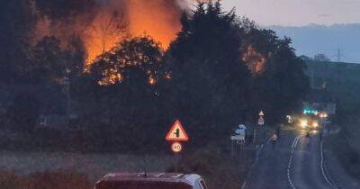 Huge fire shuts Scots road as emergency services rush to scene - www.dailyrecord.co.uk - Scotland