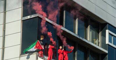 Activists scale roof of Glasgow arms factory as workers evacuated and equipment destroyed - www.dailyrecord.co.uk - Britain - France - Scotland - Palestine