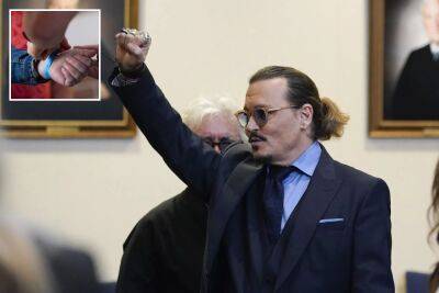Johnny Depp, Amber Heard trial notebook sells for $15K, wristbands now on eBay for $5K - nypost.com - Los Angeles