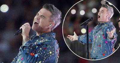 Robbie Williams rocks a new hairstyle as he performs during Soccer Aid - www.msn.com - Birmingham