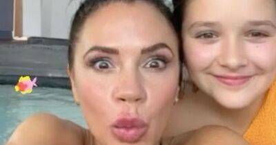 Victoria Beckham and 'water baby' daughter Harper pout as they splash around in pool - www.ok.co.uk - county Harper