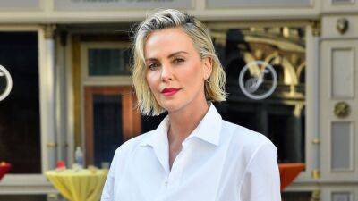 Charlize Theron on Getting to 'Play' in the MCU and Returning for 'Fast X' (Exclusive) - www.etonline.com