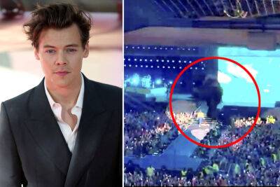 Harry Styles fan plunges from stadium balcony at concert in shocking video - nypost.com - Scotland