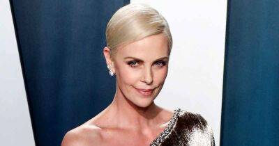 A New Look! Charlize Theron Ditches Her Signature Blonde Hairdo for a Jet Black Mullet - www.usmagazine.com - South Africa