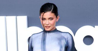 Kylie Jenner Debuts New Trend in Cutout Dress With Leg Warmers and Sandal Heels - www.usmagazine.com - county Story