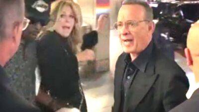 Tom Hanks - Rita Wilson - Elvis - Tom Hanks Yells at Fans to 'Back the F**k Off' After They Cause Wife Rita Wilson to Trip - etonline.com - Hollywood - New York