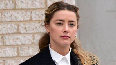 Johnny Depp - Amber Heard - Amber Heard Says Doctor's Binder Could Have Changed Johnny Depp Verdict if Allowed Into Evidence - etonline.com - city Savannah, county Guthrie - county Guthrie