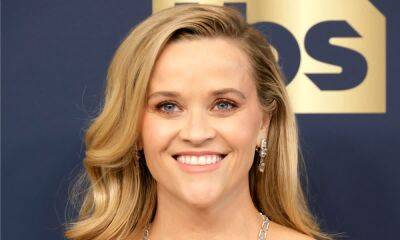 Reese Witherspoon shares rare photograph of husband Jim Toth with son Tennessee for Father's Day tribute - hellomagazine.com - Tennessee