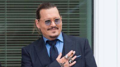 Johnny Depp - Amber Heard - Johnny Depp Reacts to Winning Defamation Case Against Amber Heard - etonline.com