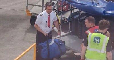 Pilot at Edinburgh airport spotted helping load luggage on to plane - dailyrecord.co.uk - Britain - Scotland - Beyond