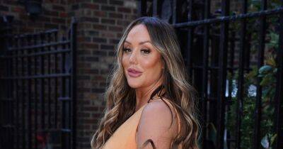 Holly Hagan - Geordie Shore - Vera Wang - Jake Ankers - Pregnant Charlotte Crosby flashes bum in unusual one-legged jumpsuit at gender reveal party - ok.co.uk - Charlotte - county Crosby - city Newcastle - county Dawson - city Charlotte, county Crosby