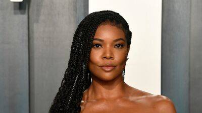 Gabrielle Union Wore a Crochet Bra Top With a Low-Rise Micro-Miniskirt - glamour.com