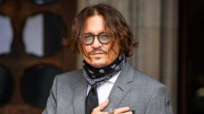 Johnny Depp - Amber Heard - Tiktok - Johnny Depp Says 'Fake Accounts' Are Posing As Him, Warns Fans To 'Remain Cautious' - etonline.com