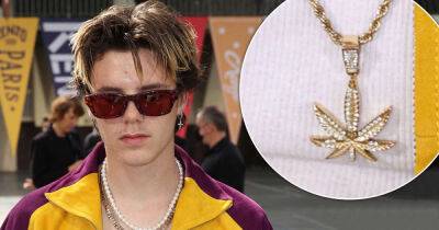 Cruz Beckham - Cruz Beckham, 17, sports a gold cannabis necklace with a trendy jacket - msn.com