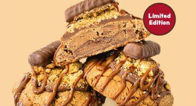 Mrs Fields releases incredible Twix-stuffed cookie in time for World Chocolate Day - newidea.com.au