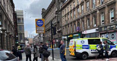 Glasgow city centre street locked down by cops after man 'attacked' - www.dailyrecord.co.uk - Scotland - city Glasgow