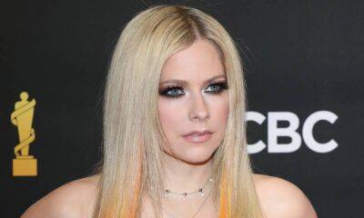 Avril Lavigne praised by fans as she pens tribute in honor of emotional anniversary - hellomagazine.com