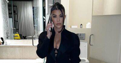 Kourtney Kardashian Says ‘This Is Mrs. Barker’ as She Goes Shirtless Under a Blazer - www.usmagazine.com - California - Italy